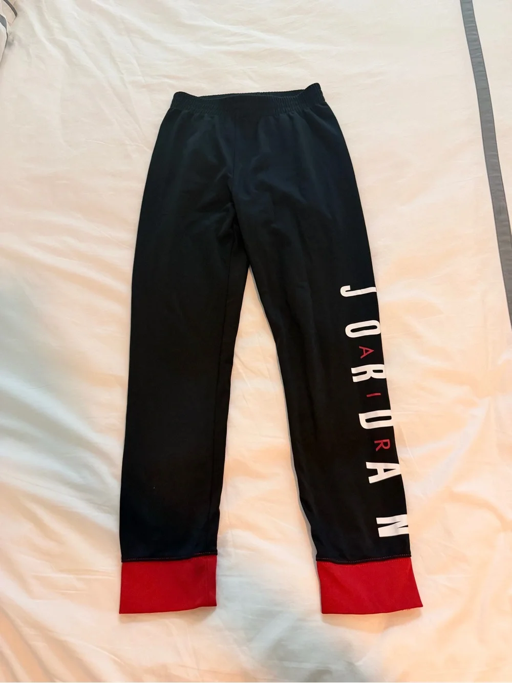 Jordan Kids Red and Black Track Set with Logo size medium like new!